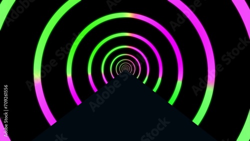 Abstract neon tunnel with glowing pink and green concentric circles on a black background.