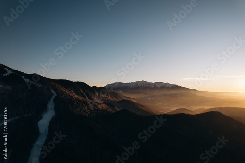 Mountains at sunset in winter.Top view of the mountains