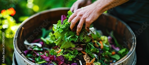 People compost bio trash from food waste in home compost bins to decrease global pollution.