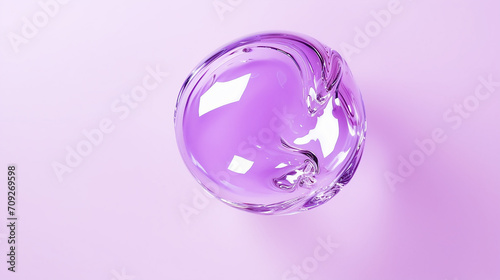A purple jelly ball on a lilac background. Transparent slime texture photo