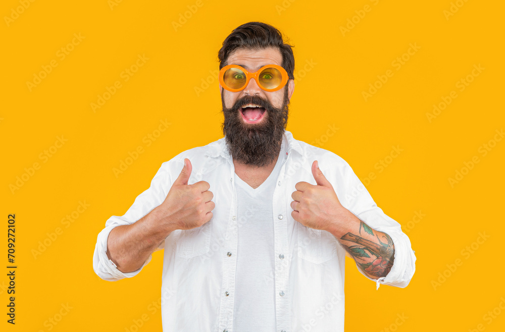 amazed caucasian stylish guy in studio, thumb up. caucasian stylish guy on background. amazed caucasian stylish guy in studio, thumb up. caucasian stylish guy on background.