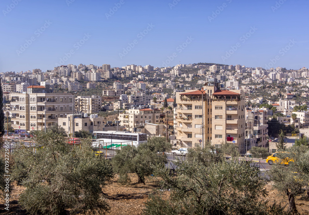 The panorama of the Beit Jala city in Palestinian West Bank (Palestine) close to border with Israel with the residential buildings on the background.