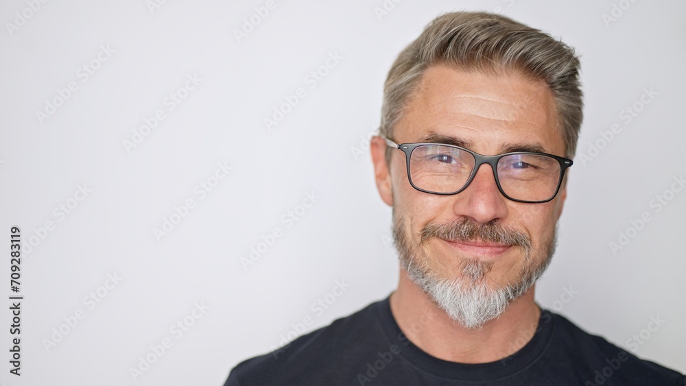 Portrait of happy, confident older man on white background looking at camera smiling. Mature age, middle age, mid adult casual guy in 50s, bearded, gray hair, wearing glasses. Portrait of happy, confident older man on white background looking at camera smiling. Mature age, middle age, mid adult casual guy in 50s, bearded, gray hair, wearing glasses.