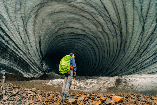 Rounded tunnel ice cave view from the inside. Cueva de Jimbo, Ushuaia, Tierra del Fuego photo