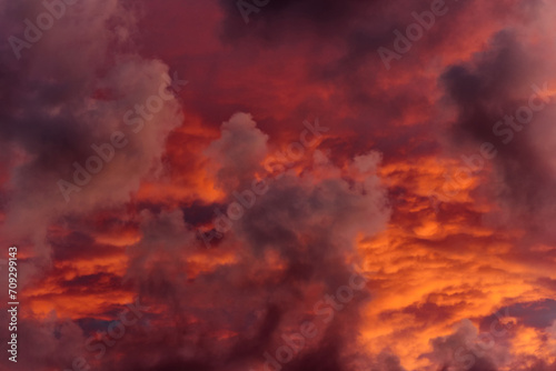 an extraordinary mesmerizing view of the gloomy fiery sky at dawn