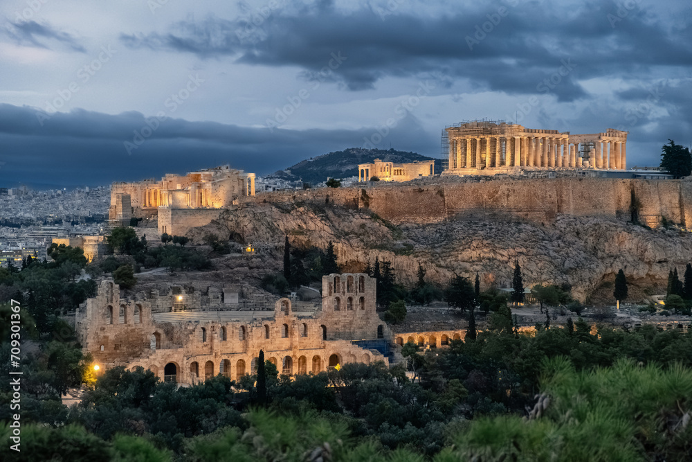 Aerial view of Acropolis of Athens with Parthenon temple in the night in Athens, Greece. Ancient Greek architecture at twilight. Popular travel destination