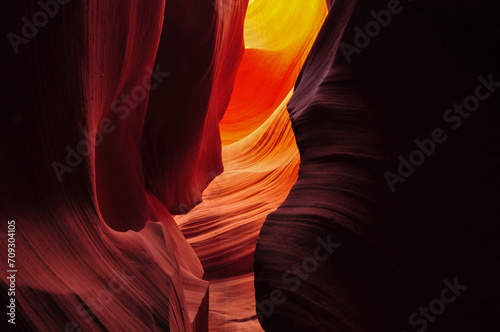 The sinuous shapes and warm tones of the sandstone walls of Lower Antelope Canyon, Page, Arizona, USA.