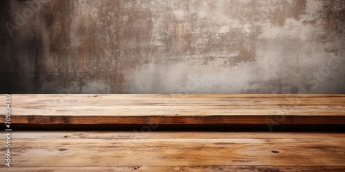 Ready for your product display or montage  the wooden table is empty over a grunge wall.