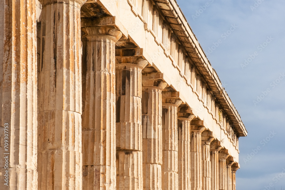 Collonade of Temple of Hephaestus in Ancient Agora, Athens, Greece. Ancient Greek architecture. Popular travel destination Collonade of Temple of Hephaestus in Ancient Agora, Athens, Greece. Ancient Greek architecture. Popular travel destination