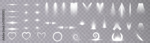 Set of lighting effects. Set of isolated white transparent light effects, spotlights, hearts, glare, explosion, lines, glitter, solar flare, and stars, curve rotation. Sunlight, abstract special effec