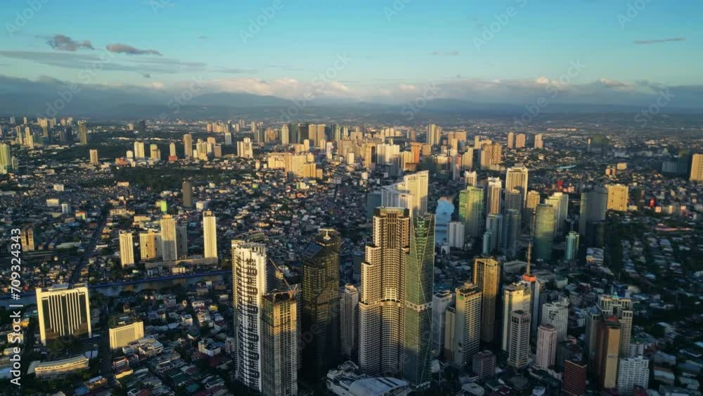 Aerial view of skyscrapers buildings in Makati business district and Manila city at sunset, capital of Philippines, panorama 4k Aerial view of skyscrapers buildings in Makati business district and Manila city at sunset, capital of Philippines, panorama 4k
