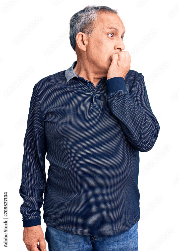 Senior handsome man wearing casual polo looking stressed and nervous with hands on mouth biting nails. anxiety problem. Senior handsome man wearing casual polo looking stressed and nervous with hands on mouth biting nails. anxiety problem.