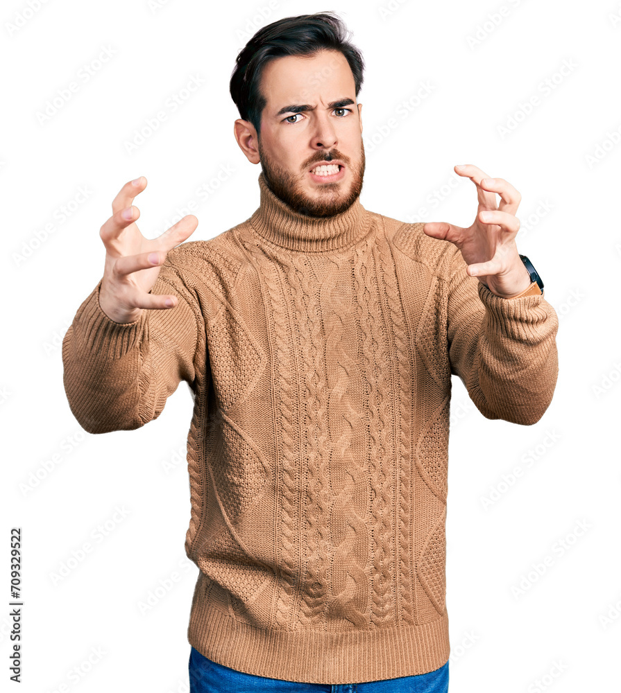 Young hispanic man wearing casual clothes shouting frustrated with rage, hands trying to strangle, yelling mad Young hispanic man wearing casual clothes shouting frustrated with rage, hands trying to strangle, yelling mad