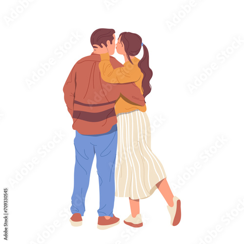 Back view of beloved man and woman couple kissing standing cuddling together feeling passion