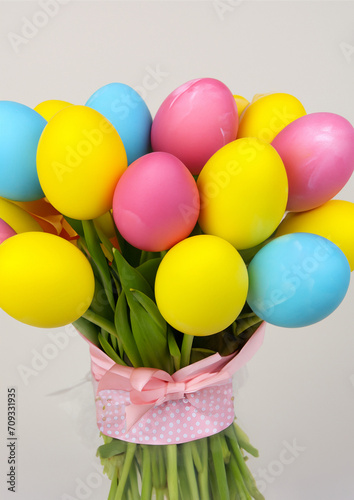 Bouquet of colorful Easter eggs arranged like flowers, happy easter