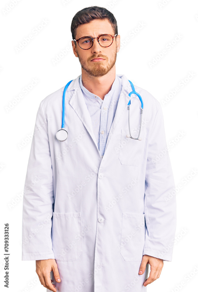 Handsome young man with bear wearing doctor uniform depressed and worry for distress, crying angry and afraid. sad expression. Handsome young man with bear wearing doctor uniform depressed and worry for distress, crying angry and afraid. sad expression.