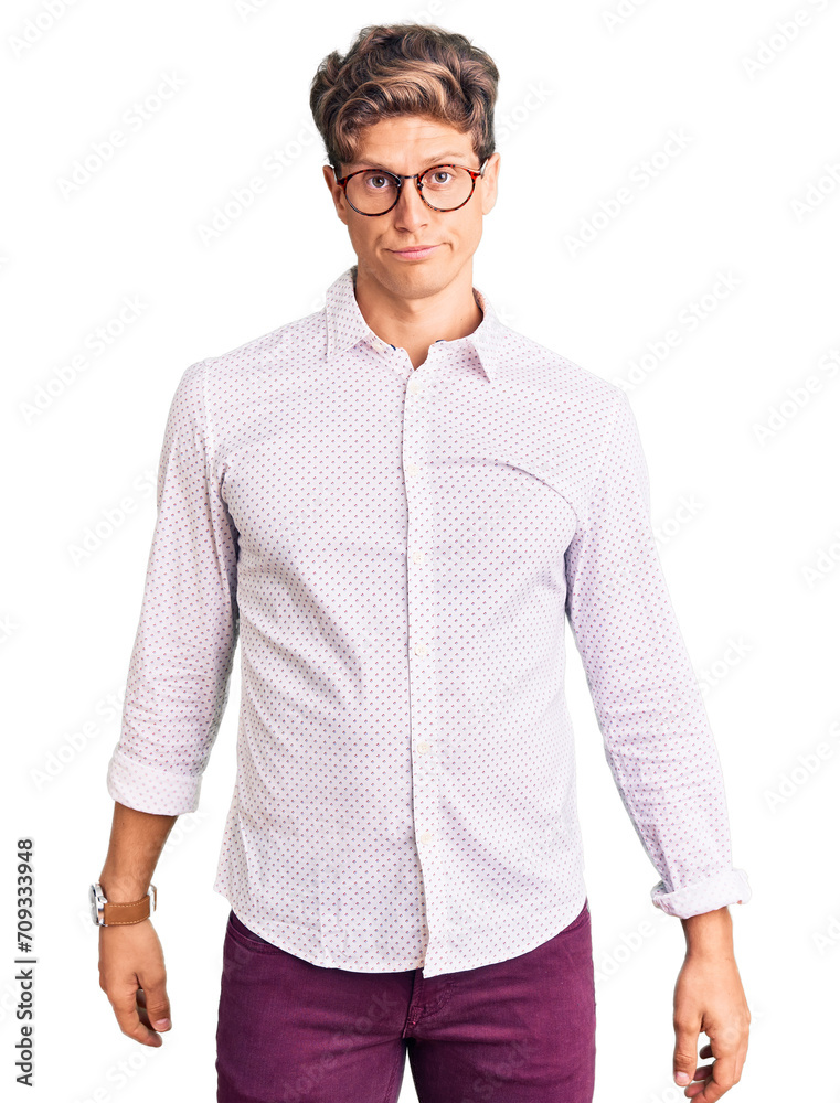Young handsome man wearing business clothes and glasses depressed and worry for distress, crying angry and afraid. sad expression. Young handsome man wearing business clothes and glasses depressed and worry for distress, crying angry and afraid. sad expression.