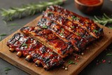 Closeup of pork ribs grilled with BBQ sauce and caramelized in honey. Tasty snack to beer