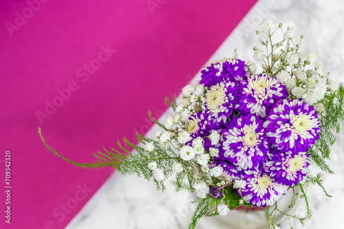 Bouquet of white and purpule flowers photo