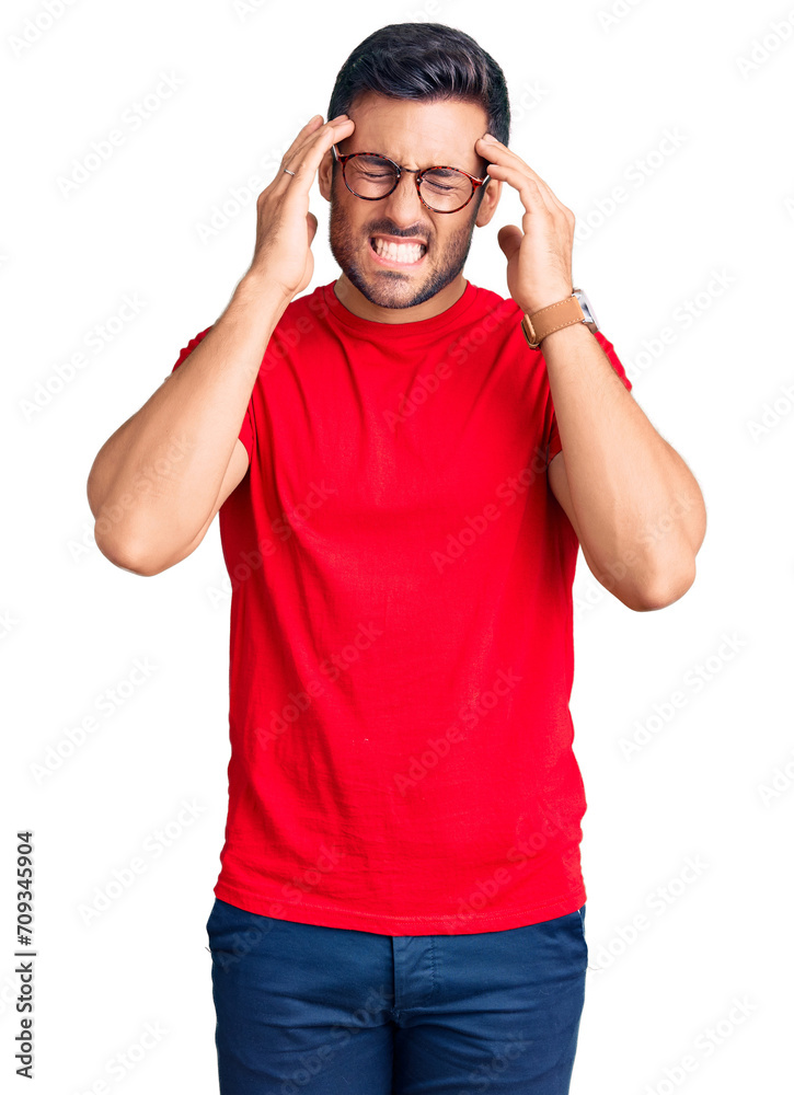 Young hispanic man wearing casual clothes and glasses suffering from headache desperate and stressed because pain and migraine. hands on head. Young hispanic man wearing casual clothes and glasses suffering from headache desperate and stressed because pain and migraine. hands on head.