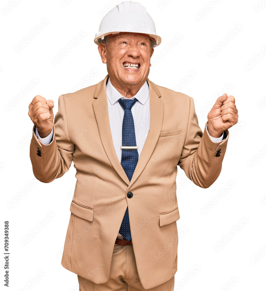 Senior caucasian man wearing architect hardhat crazy and mad shouting and yelling with aggressive expression and arms raised. frustration concept.