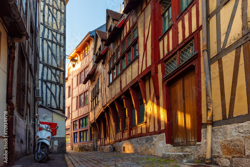 Fototapeta Naklejka Na Ścianę i Meble -  Old cozy street with typical timber frame houses in old town of Rouen, Normandy, France. Architecture and landmarks of Normandie