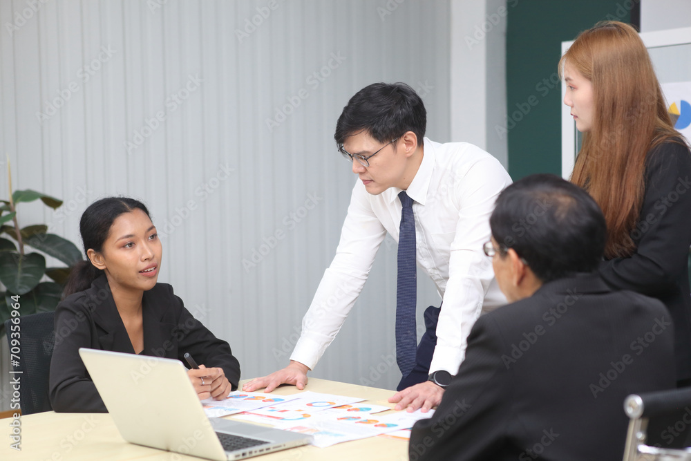 Business People, Successful business professionals. Diverse team celebrating business success at meeting. Business People, Successful business professionals. Diverse team celebrating business success at meeting.