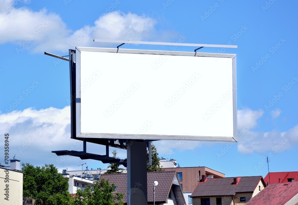 Empty billboard in the background of residential buildings with space for advertising Empty billboard in the background of residential buildings with space for advertising