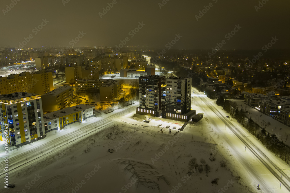 Night air photography of the city of Tallinn, Lasnamae district in winter, photo with low light.