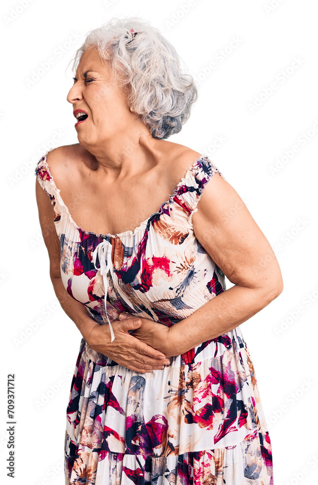 Senior grey-haired woman wearing casual clothes with hand on stomach because nausea, painful disease feeling unwell. ache concept. Senior grey-haired woman wearing casual clothes with hand on stomach because nausea, painful disease feeling unwell. ache concept.
