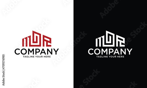 Initials MD R Building logo design on a black and white background.