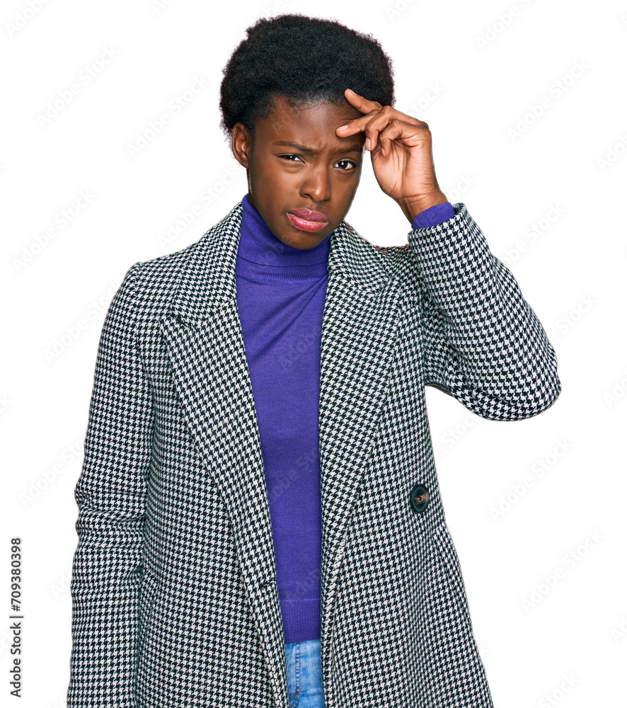 Young african american girl wearing casual clothes worried and stressed about a problem with hand on forehead, nervous and anxious for crisis Young african american girl wearing casual clothes worried and stressed about a problem with hand on forehead, nervous and anxious for crisis
