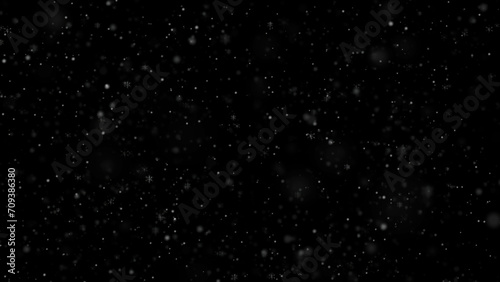 Falling white snow. Snowflakes on overlay black background