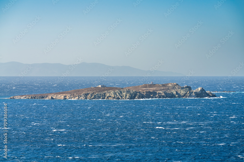 Mpaos desert island near the coast of Mykonos island. Greece