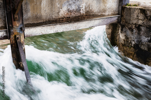 Water level regulating gates in a city Annecy - France