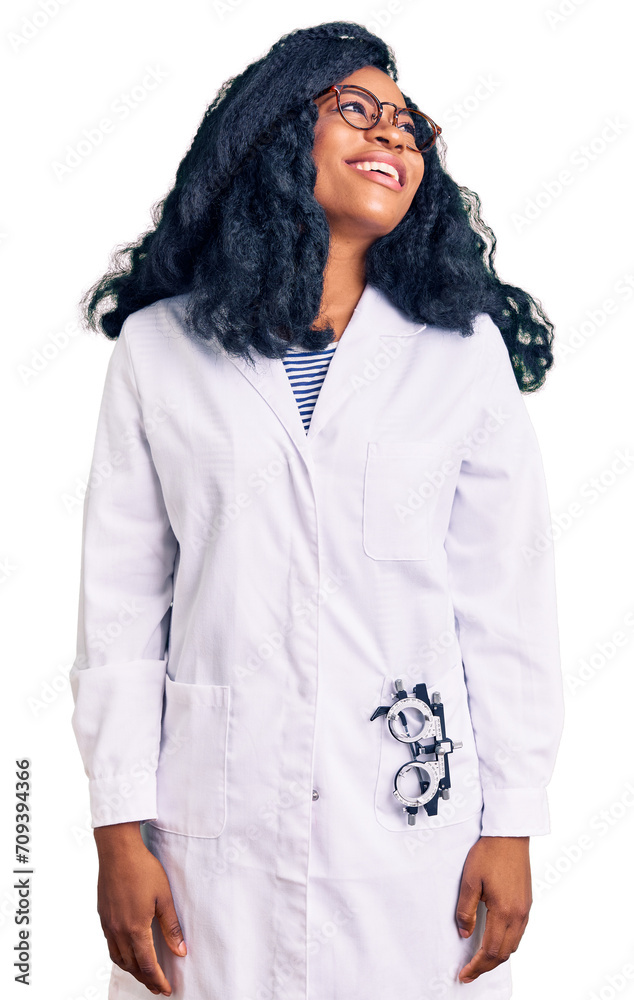 Beautiful african american optician woman with optometry glasses looking away to side with smile on face, natural expression. laughing confident.
