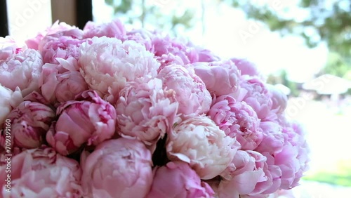 bouquet of pink peonies at an event close up. valentine's day and march 8