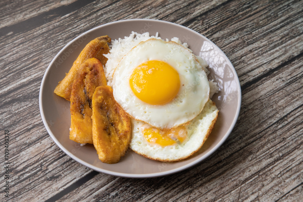 White rice with english fried egg and fried bananas cuban food simple comfort food White rice with english fried egg and fried bananas cuban food simple comfort food