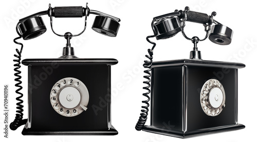 Isolated photo of old fashioned, black colored, baroque style telephone device on white background. Front and side view.
