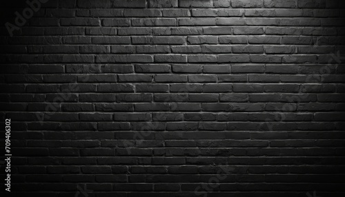 Many bricks are used on the surface of the black wall. or old black brick wall abstract pattern. beautiful dark background.