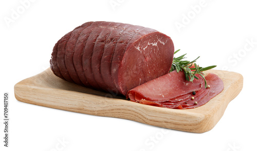 Tasty fresh dry bresaola, peppercorns and rosemary isolated on white