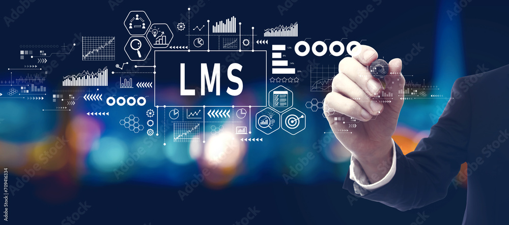 LMS - Learning Management System with businessman in a city at night LMS - Learning Management System with businessman in a city at night