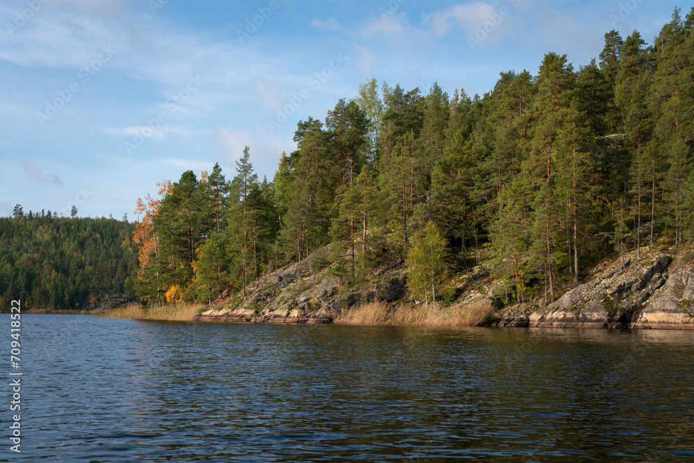 Lake Ladoga near the village Lumivaara on a sunny autumn day, Ladoga skerries, Lakhdenpokhya, Republic of Karelia, Russia Lake Ladoga near the village Lumivaara on a sunny autumn day, Ladoga skerries, Lakhdenpokhya, Republic of Karelia, Russia