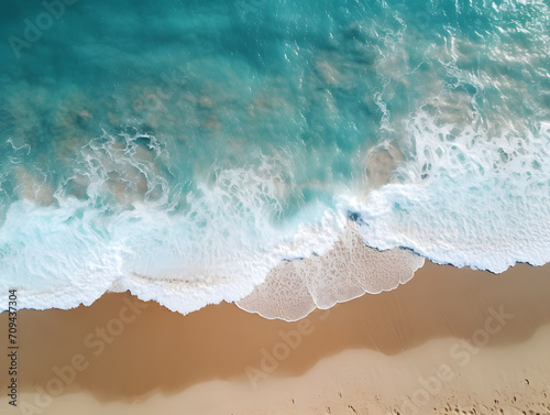 Aerial view of beautiful sandy beach with turquoise ocean waves