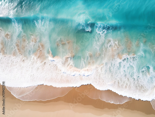 Aerial view of beautiful sandy beach with turquoise ocean waves