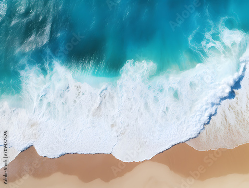 Aerial view of beautiful sandy beach with turquoise ocean waves
