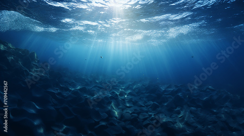 dark blur ocean surface seen from underwater