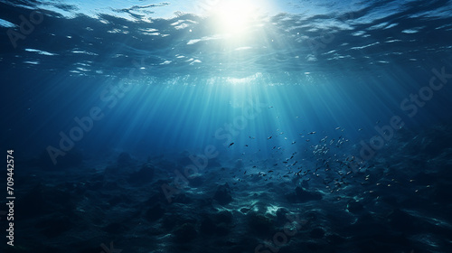 dark blur ocean surface seen from underwater with sunlight