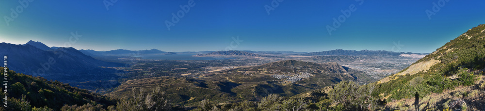 Lone Peak and surrounding landscape from Jacob’s Ladder hiking trail, Lone Peak Wilderness, Wasatch Rocky Mountains, Utah, United States. Lone Peak and surrounding landscape from Jacob’s Ladder hiking trail, Lone Peak Wilderness, Wasatch Rocky Mountains, Utah, United States.