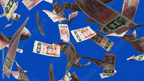 3D animation of Jamaican dollar notes Falling On blue screen. Remove the background by keying or subtracting with the black and white matte to replace with a custom one
 photo